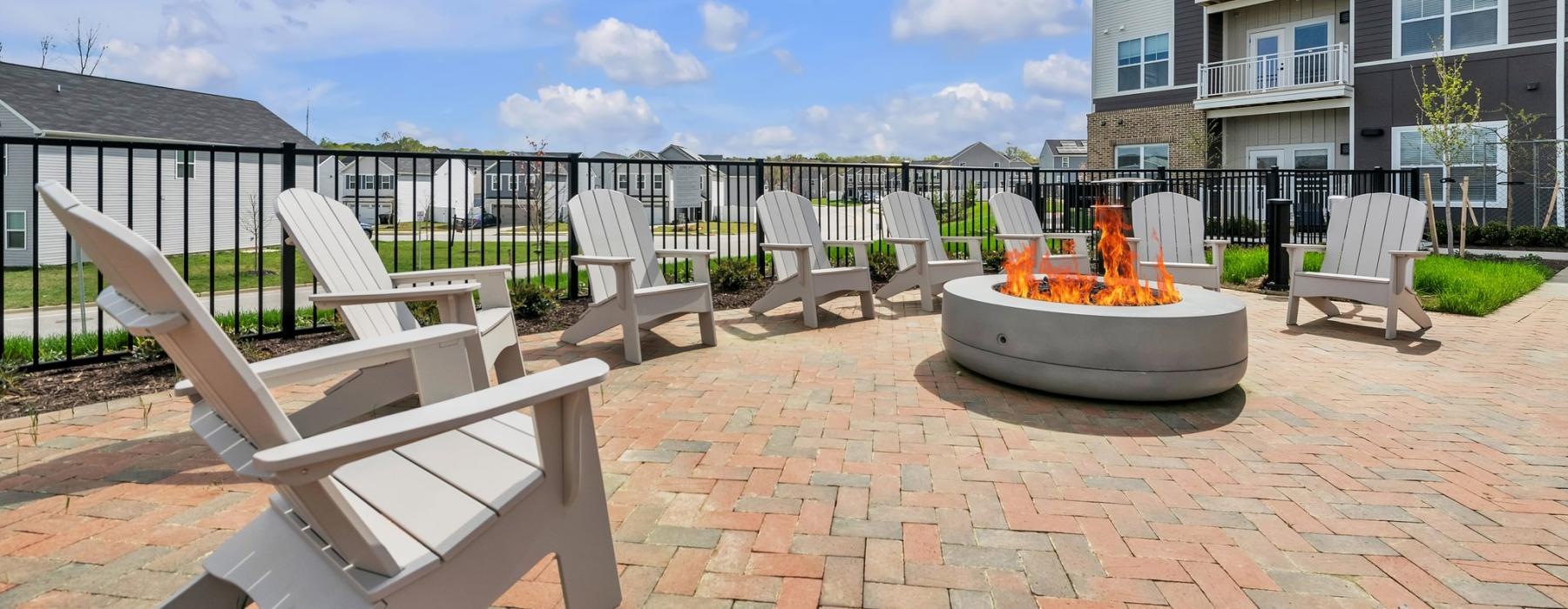 lounge chairs around fire pit