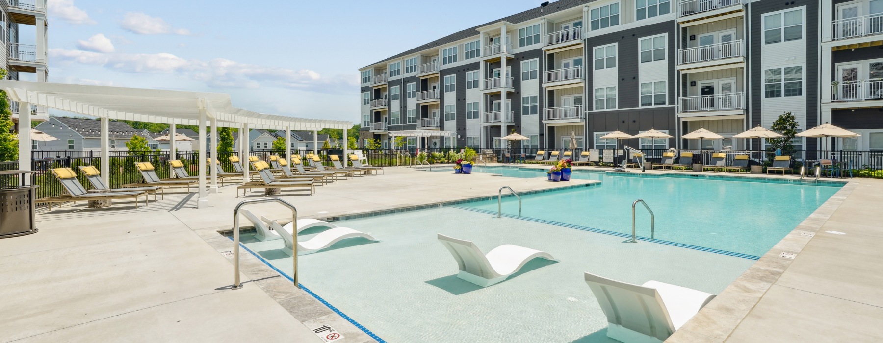 resort-style pool with lounge seating